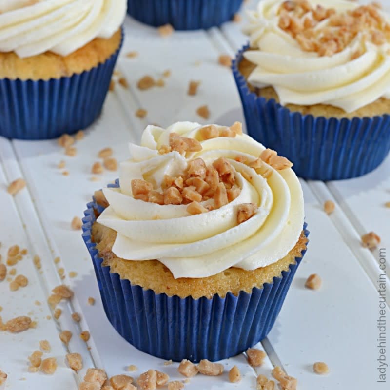 <p>Lady Behind the Curtain</p><p> These tender cupcakes are filled with toffee bits and toasted butter pecans.</p><p><strong>Get the recipe:</strong> <a href="https://www.ladybehindthecurtain.com/toasted-butter-pecan-cupcakes/" rel="nofollow noopener" target="_blank" data-ylk="slk:Toasted Butter Pecan Cupcakes;elm:context_link;itc:0;sec:content-canvas" class="link rapid-noclick-resp"><strong>Toasted Butter Pecan Cupcakes</strong></a></p>