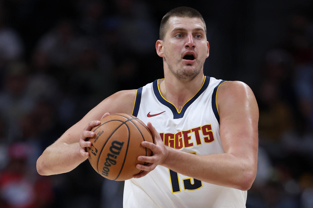 Nikola Jokic of the Denver Nuggets is the easy pick at the top of fantasy basketball drafts. (Photo by Matthew Stockman/Getty Images)