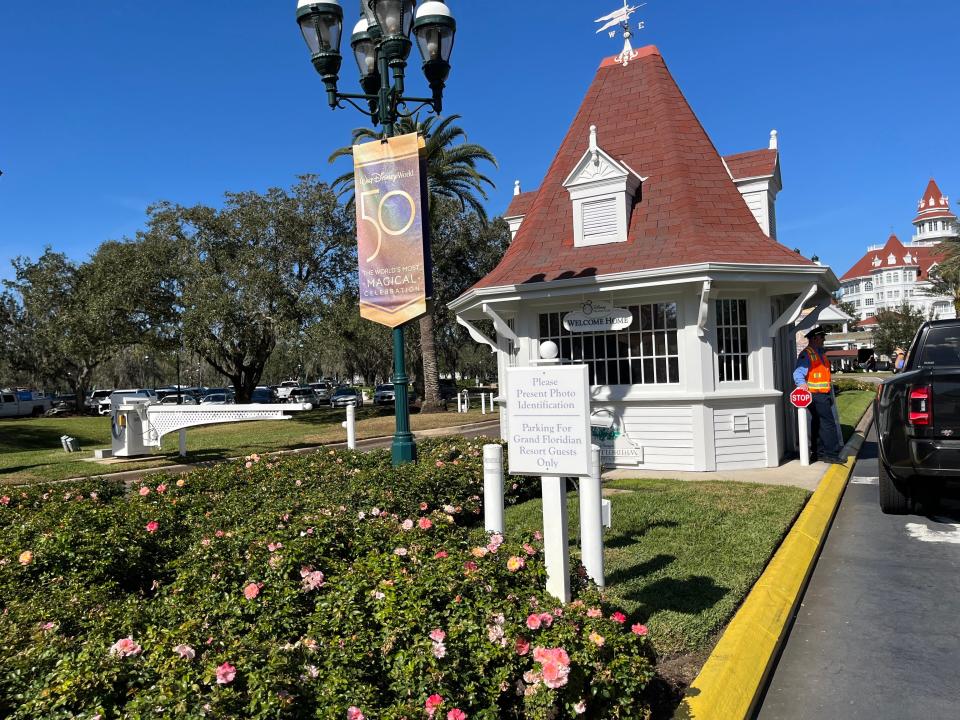 security building outside the parking lot of grand floridian resort at disney world