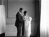 <p>The Duke and Duchess of York (the future King George VI and the Queen Mother) and their daughter Princess Elizabeth at her christening in May 1926. (PA Images via Getty Images)</p> 