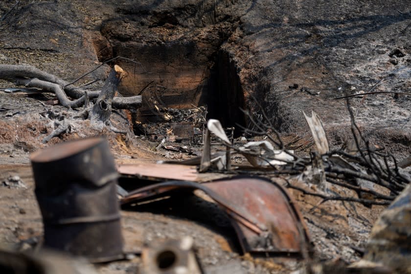 NAPA, CA - AUGUST 25: Burnt out wreckage at a property along CA-128 where the LNU Lightning complex fire tore through last week, photographed on Tuesday, Aug. 25, 2020 in Napa, CA. McNeal said his mother, Mary Hintemeyer, her boyfriend Leo McDermott and his son, Tom McDermott took refuge from the LNU Lightning Complex Fire in a makeshift fire shelter on their Napa County property, but the trio never made it out alive.