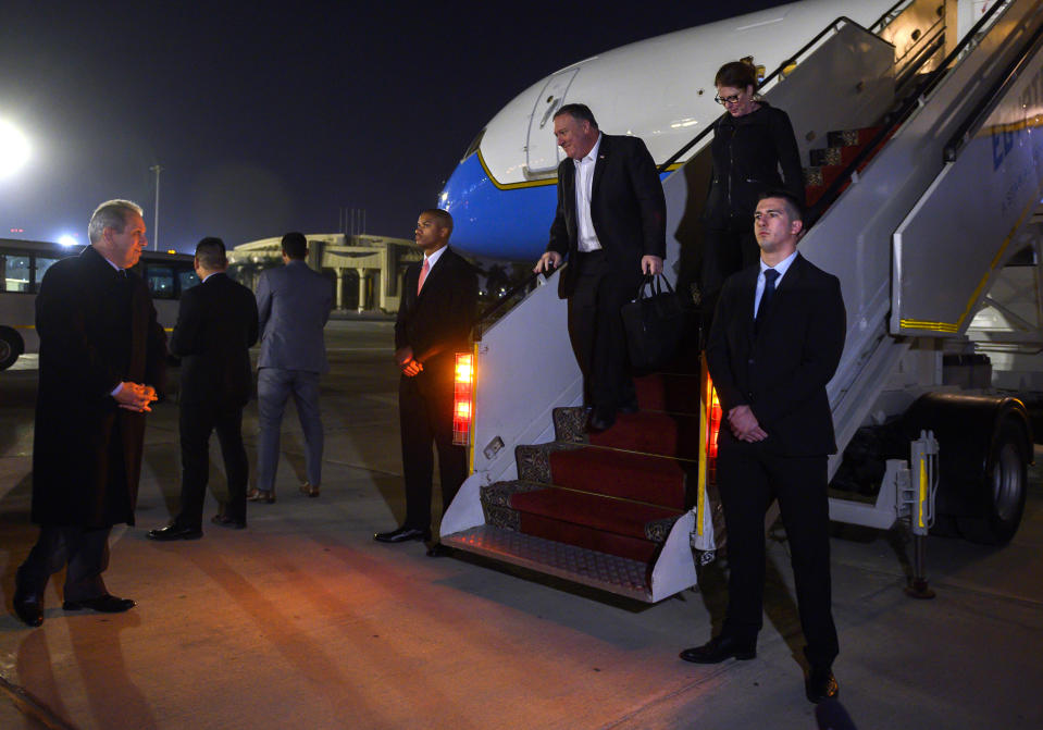 U.S. Secretary of State Mike Pompeo, and his wife Susan, second from right, arrive at Cairo International Airport in Cairo, Wednesday, Jan. 9, 2019. (Andrew Caballero-Reynolds/Pool Photo via AP)