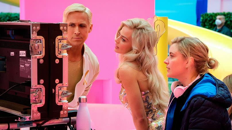 (Left to right) Ryan Gosling, Margot Robbie and Greta Gerwig on the set of 'Barbie'