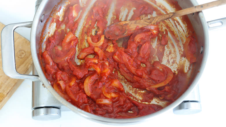 tomato paste cooked with onions and garlic
