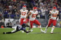 Kansas City Chiefs tight end Travis Kelce (87) rushes past Baltimore Ravens cornerback Tavon Young in the second half of an NFL football game, Sunday, Sept. 19, 2021, in Baltimore. (AP Photo/Nick Wass)