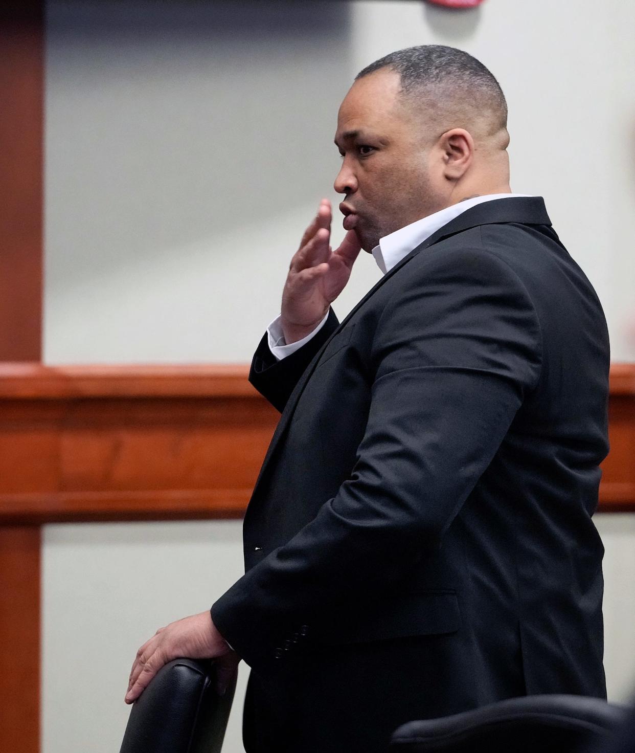 Marcus Pinckney blows a kiss to the gallery during his murder trial in DeLand, Friday, Dec. 2, 2022.