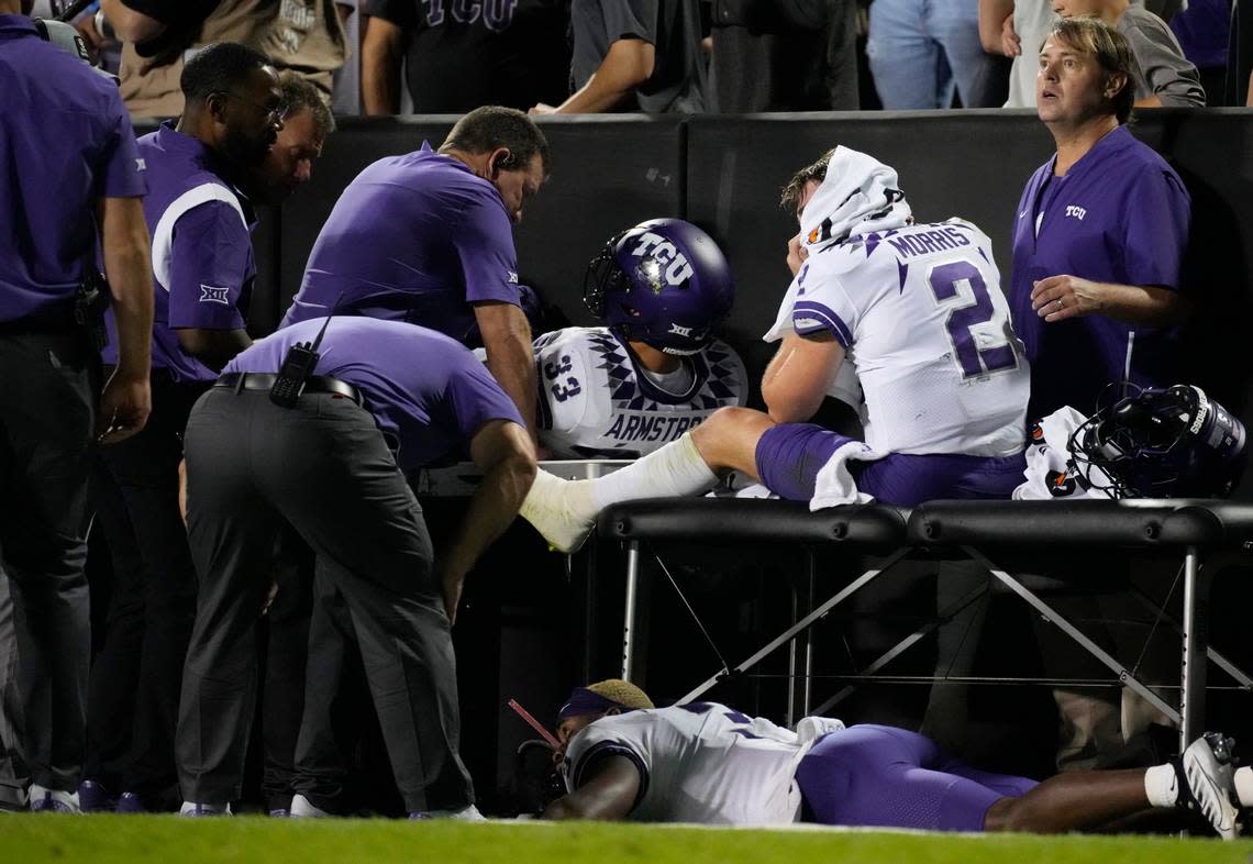 TCU quarterback Chandler Morris, right, is attended to by trainers after being injured against Colorado on Sept. 2, 2022, in Boulder, Colo.