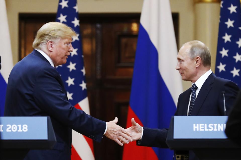 FILE In this file photo taken on Monday, July 16, 2018, U.S. President Donald Trump shakes hand with Russian President Vladimir Putin at the end of the press conference after their meeting at the Presidential Palace in Helsinki, Finland. The pullout of U.S. troops from Syria ordered by President Donald Trump could further bolster Moscow’s clout in Syria, but it may also destabilise Russia's standing in the region. (AP Photo/Alexander Zemlianichenko, File)