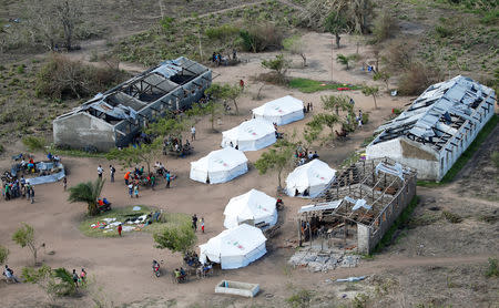 Tents belonging to aid organisations are seen after Cyclone Idai at Guara Guara village outside Beira, Mozambique, March 22, 2019. REUTERS/Siphiwe Sibeko