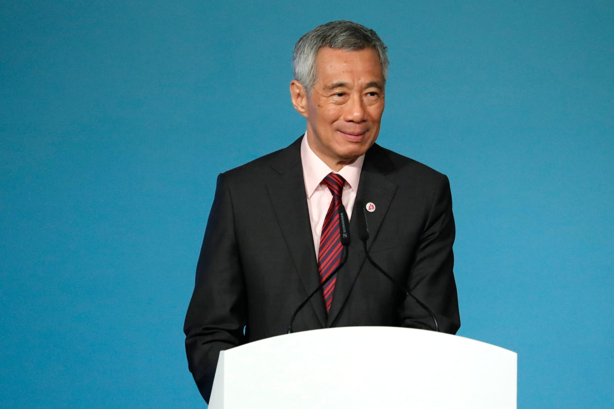 Singapore’s Prime Minister Lee Hsien Loong delivers his opening address during the 32nd ASEAN Summit on Saturday, April 28, 2018, in Singapore. (AP Photo/Yong Teck Lim)