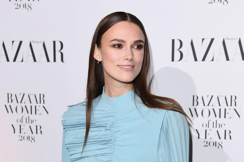 Keira Knightley smiles at a Bazaar magazine event