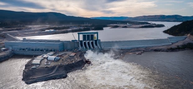 An aerial photo of the powerhouse on the Muskrat Falls project site, including the spillway and the project's north dam. The hydroelectric dam is expected to begin producing power for Newfoundland in November. (Nalcor Energy - image credit)