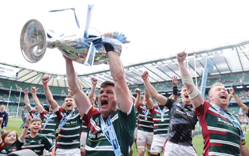 Match-winner Freddie Burns celebrates with the Premiership trophy - GETTY IMAGES