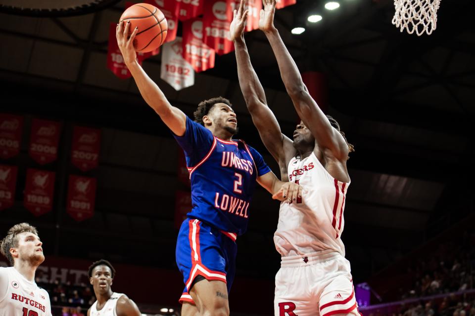 UMass Lowell guard Ayinde Hikim, pictured in action on Nov. 12 at Rutgers, scored 21 points against Bryant Saturday to help the the River Hawks win.