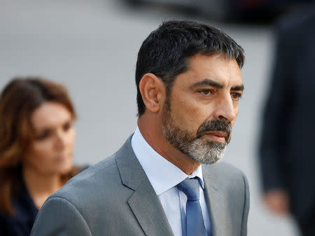 Josep Lluis Trapero, the head of the Mossos d'Esquadra, the Catalan regional police force, enters the High Court to testify for the alleged crime of sedition in Madrid, Spain, October 16, 2017. REUTERS/Juan Medina