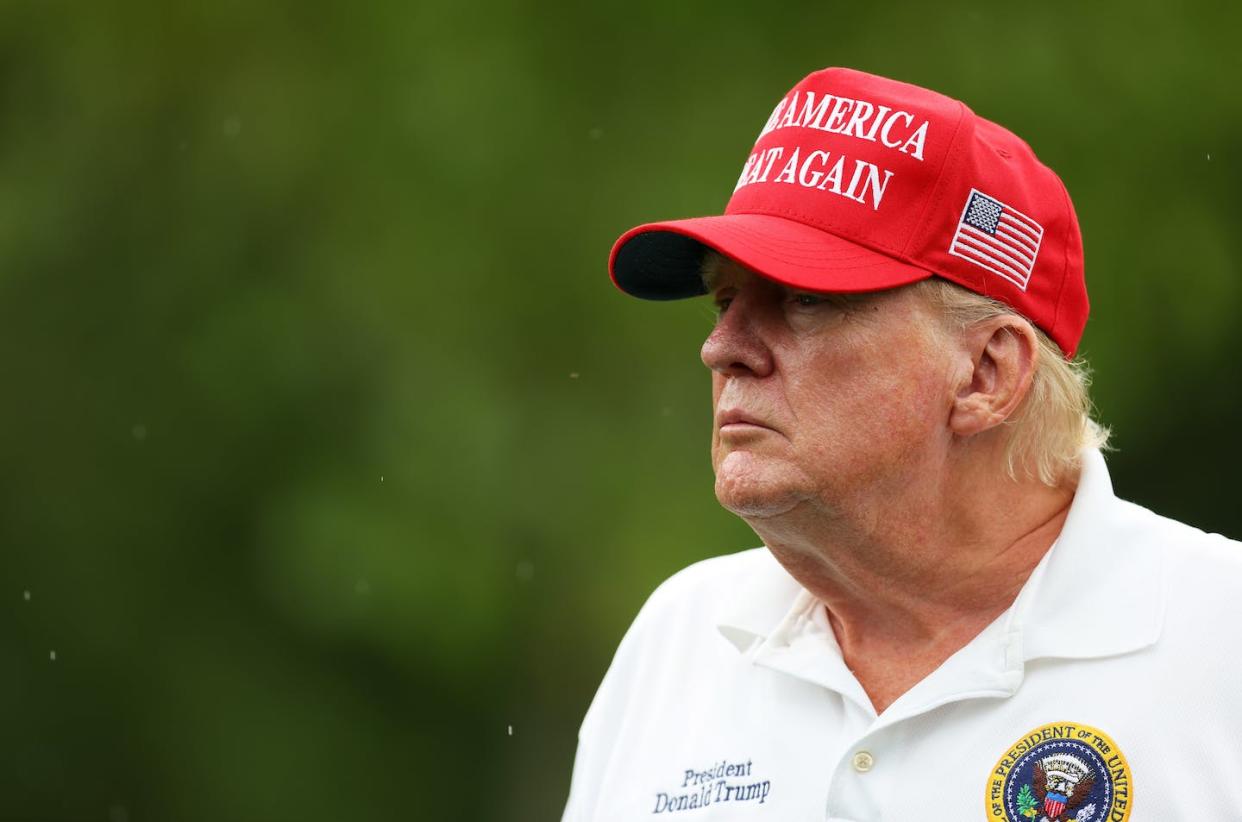 Donald Trump may be barred from holding public office due to a constitutional amendment disqualifying those who have taken part in 'insurrection or rebellion.' <a href="https://www.gettyimages.com/detail/news-photo/former-president-donald-trump-looks-on-during-the-pro-am-news-photo/1605522075?adppopup=true" rel="nofollow noopener" target="_blank" data-ylk="slk:Mike Stobe/Getty Images;elm:context_link;itc:0;sec:content-canvas" class="link ">Mike Stobe/Getty Images</a>