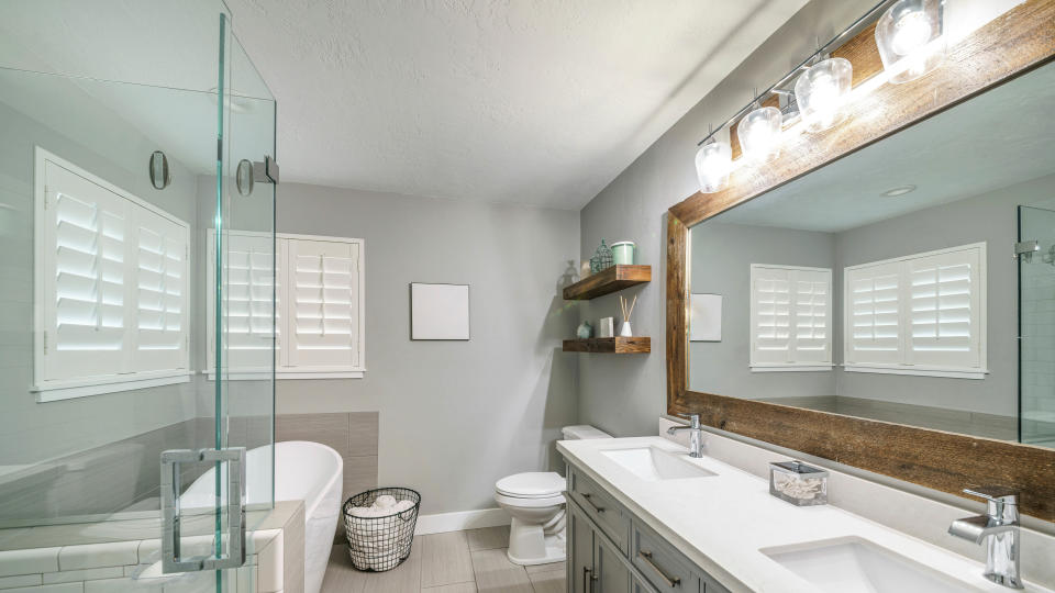 Bathroom with large mirror