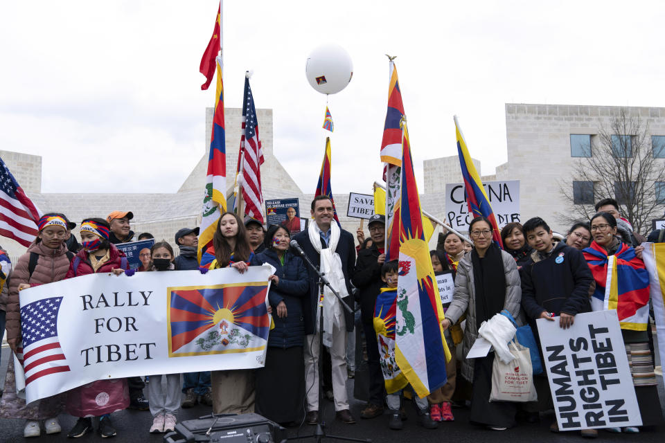 Rep. Mike Gallagher, R-Wis., center, attends a rally to commemorate the failed 1959 Tibetan uprising against China's rule, outside of the Chinese Embassy in Washington, Friday, March 10, 2023. The gathering took place on what is known as Tibetan National Uprising Day and comes as tensions between the U.S. and China continue to escalate. (AP Photo/Jose Luis Magana)
