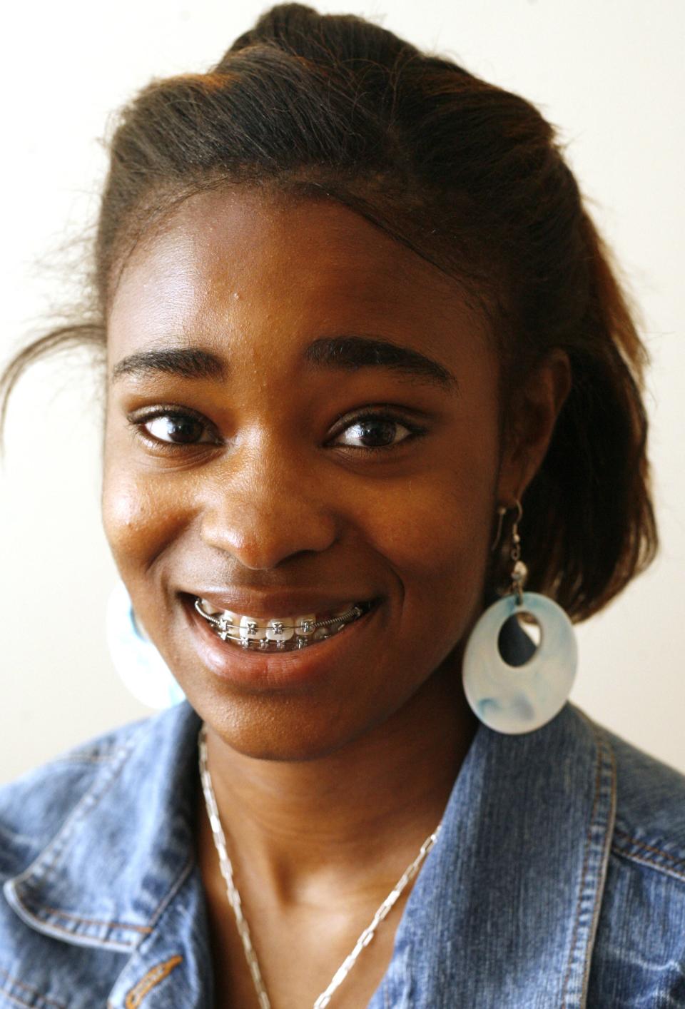 Krystina Muhammad, a member of the All-State team, photographed in June 2008. Muhammad set the girls triple jump state record.