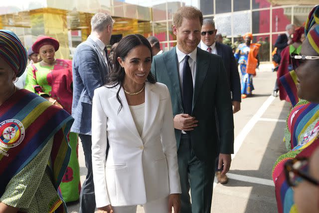 <p>AP Photo/Sunday Alamba</p> Meghan Markle and Prince Harry at the Defense headquarters in Abuja, Nigeria on May 10, 2024.
