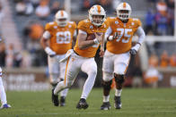 Tennessee quarterback Harrison Bailey (15) scrambles for yards against Florida during the first half of an NCAA college football game Saturday, Dec. 5, 2020, in Knoxville, Tenn. (Randy Sartin/Knoxville News Sentinel via AP, Pool)