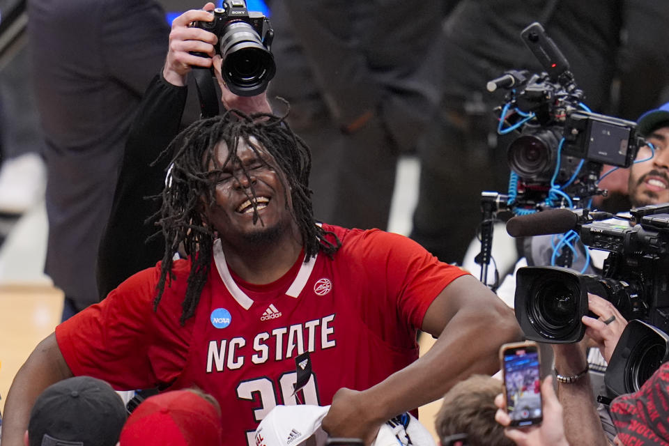 North Carolina State's DJ Burns Jr. reacts following an Elite Eight college basketball game against Duke in the NCAA Tournament in Dallas, Sunday, March 31, 2024. North Carolina State won 76-64. (AP Photo/LM Otero)