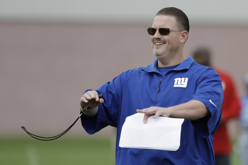 New York Giants head coach Ben McAdoo talks to his team during NFL football training camp, Tuesday, Aug. 8, 2017, in East Rutherford, N.J. (AP)