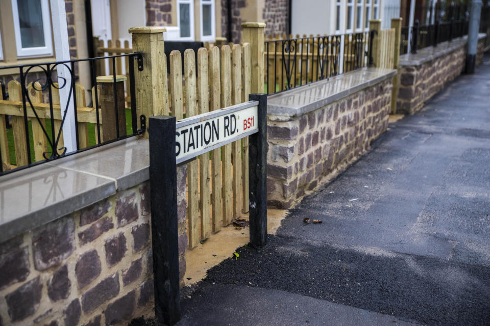 The entrance to one of the homes in Shirehampton, Bristol, has been built behind the existing Station Road street sign, which is now completely blocking the gate (swns)