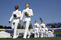 <p>Graduating U.S. Naval Academy midshipmen process into the Academy’s graduation and commissioning ceremony, Friday, May 25, 2018, in Annapolis, Md. (Photo: Patrick Semansky/AP) </p>