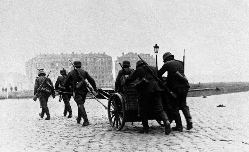 FILE - German troops in a suburb of Lille, France, May 29, 1940. (AP Photo, File)