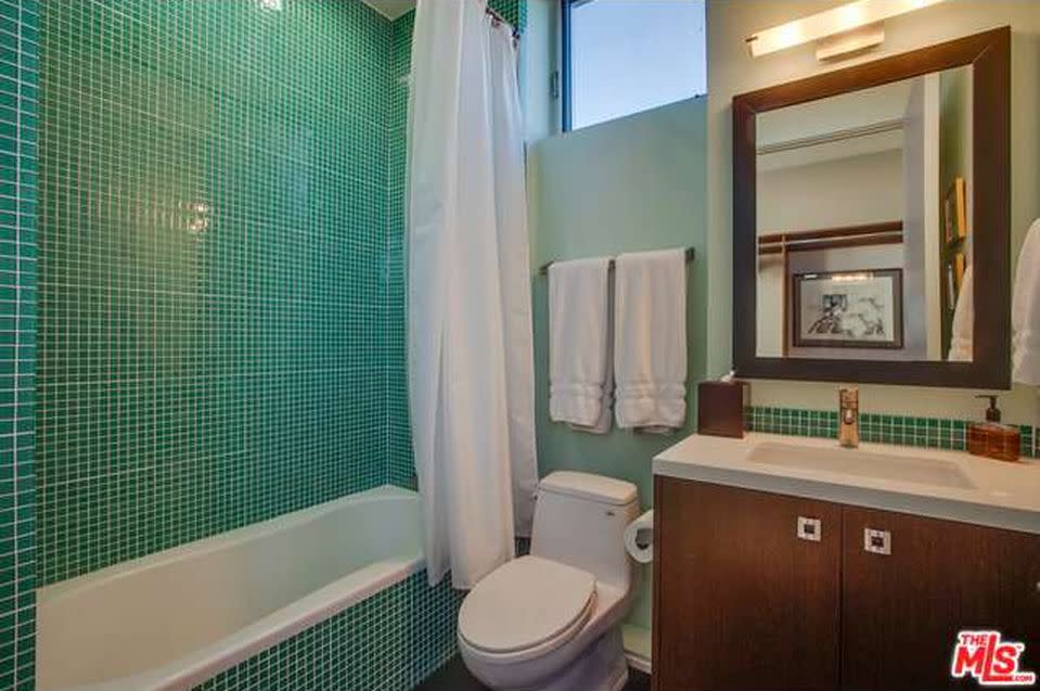 <p>And one of the three washrooms. (Zillow) </p>