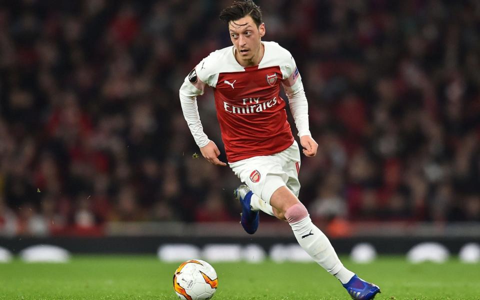 Mesut Ozil started for only the fifth time since November against Bate Borisov - AFP