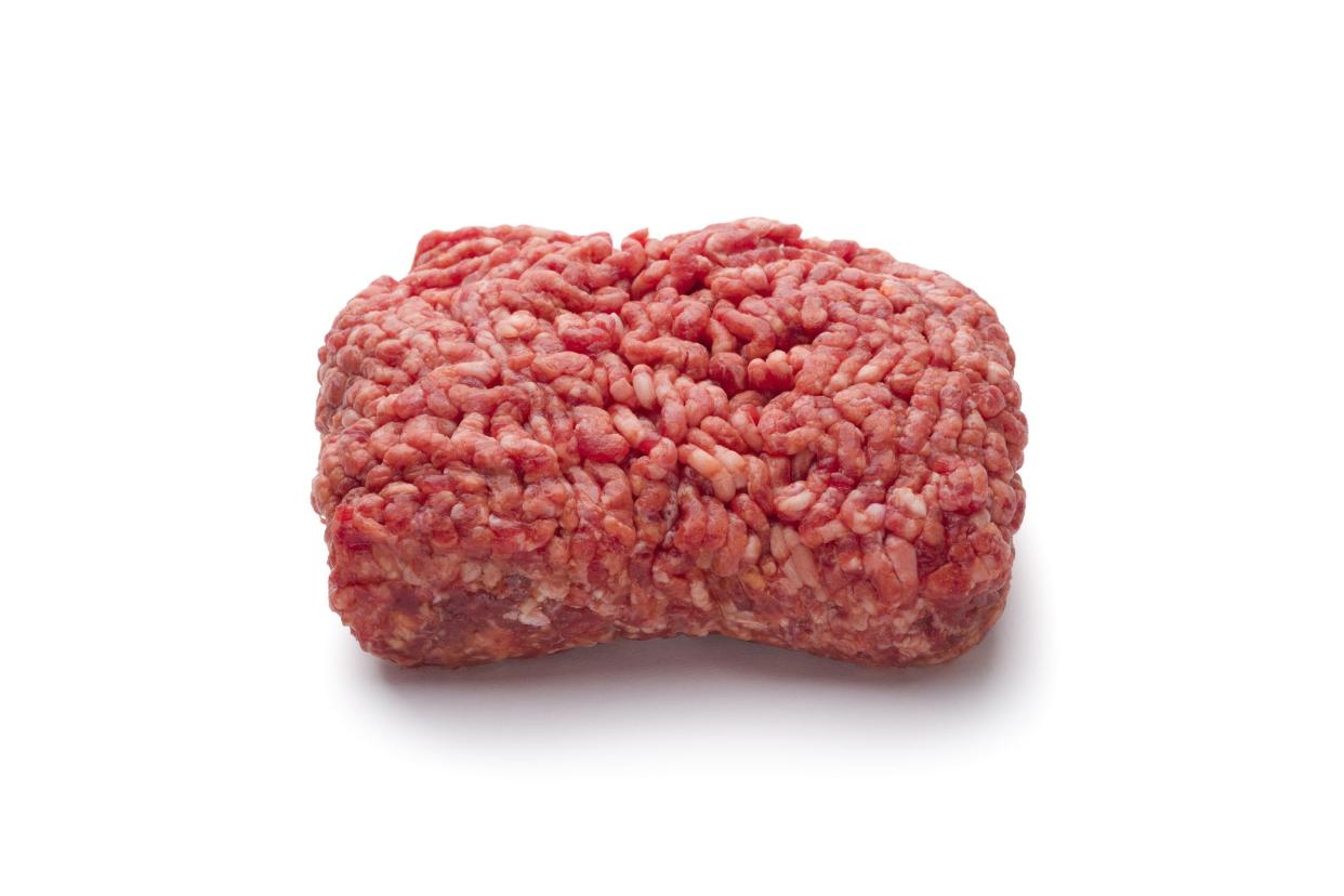 Raw minced meat isolated on white background