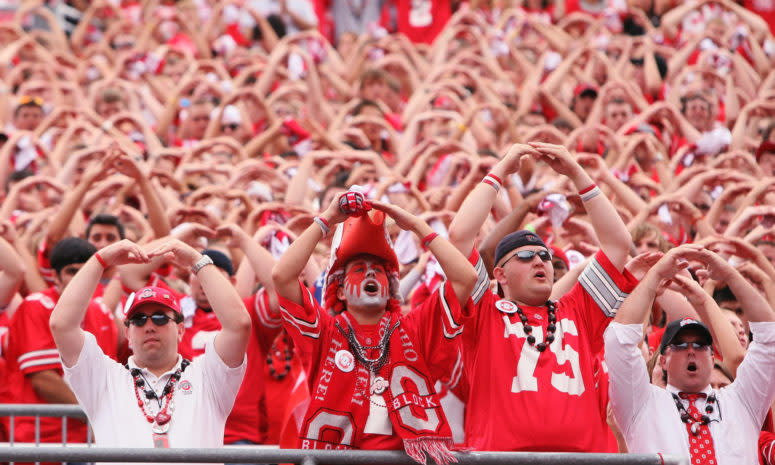 Ohio State Buckeye fans doing the "O-H-I-O" chant.