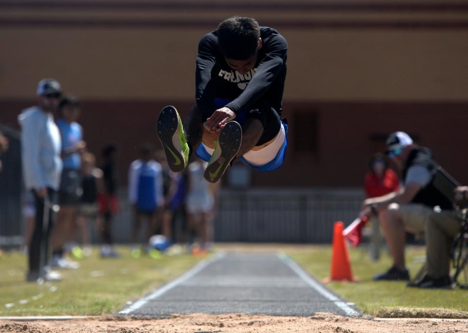 Frenship's Aden Soto competes in triple jump at the Lubbock ISD Invitational, Thursday, March 28, 2024, at Lowrey Field.
