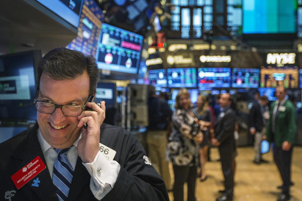 A trader works on the floor of the New York Stock Exchange (REAUTERS)