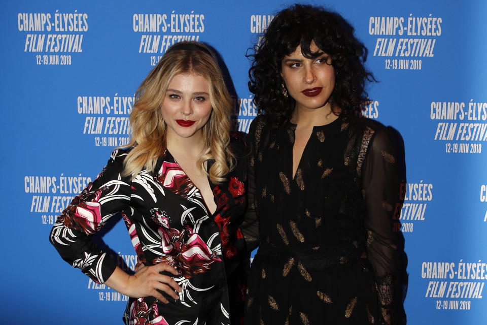 Actress Chloe Grace Moretz, left, and director Desiree Akhavan pose during a photocall for the screening of “Come as You Are” as part of the Champs Elysees Film Festival in Paris, France, Monday, June 18, 2018. (AP Photo/Francois Mori)