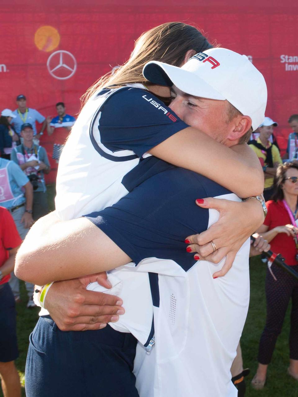 Jordan Spieth of the United States and Annie Verret celebrate the United States Team winning the 41st Ryder Cup at Hazeltine National Golf Course on October 2, 2016 in Chaska, MN