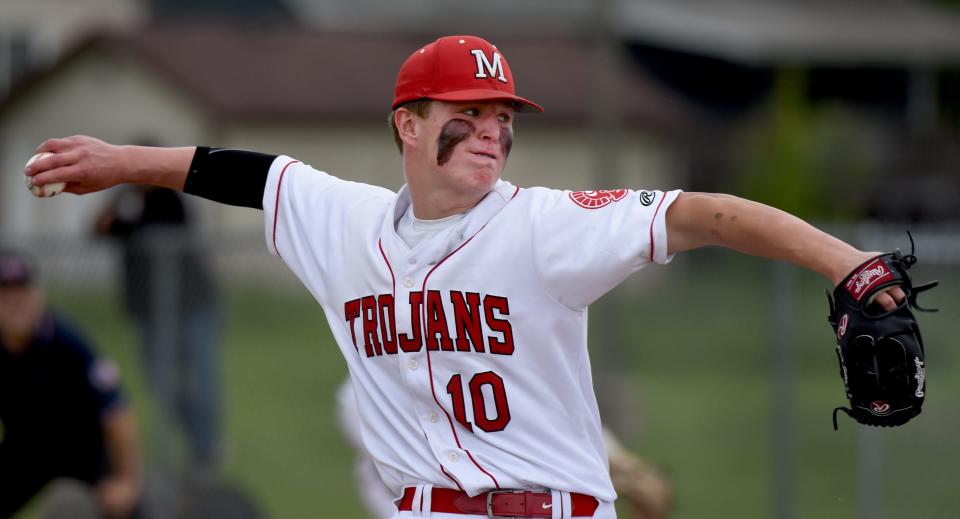 Ryan Sieler of Monroe delivers a pitch against Dexter in the early innings Friday, May 27, 2022. Monroe gave up four runs in the seventh to fall 8-4.