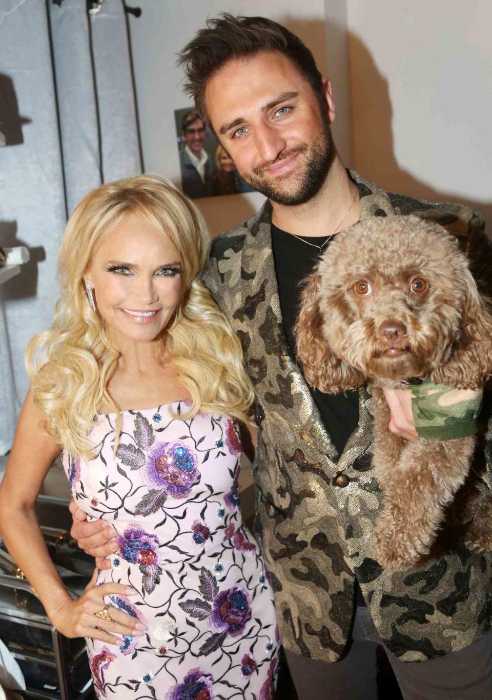 Kristin Chenoweth, boyfriend Josh Bryant and "Thunderpup" pose backstage at "Kristin Chenoweth: For The Girls" on Broadway at The Nederlander Theatre on November 16, 2019 in New York City