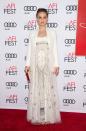 <p>Pairing a printed Dior dress with a classic crisp white blazer, the star looked every inch the film star at the premiere of her movie ‘Jackie’. [Photo: Getty] </p>