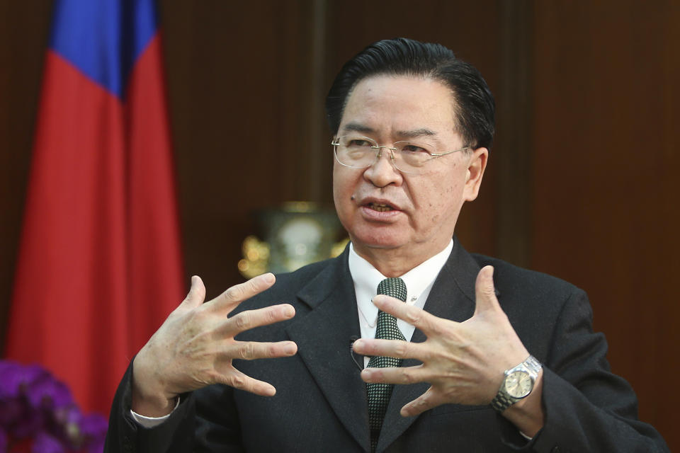 Taiwanese Foreign Minister Joseph Wu gestures while speaking during an exclusive interview with The Associated Press at his ministry in Taipei, Taiwan, Tuesday, Dec. 10, 2019. Wu was careful to say his government has no desire to intervene in Hong Kong’s internal affairs, and that existing legislation is sufficient to deal with a relatively small number of Hong Kong students or others who seek to reside in Taiwan. (AP Photo/Chiang Ying-ying)