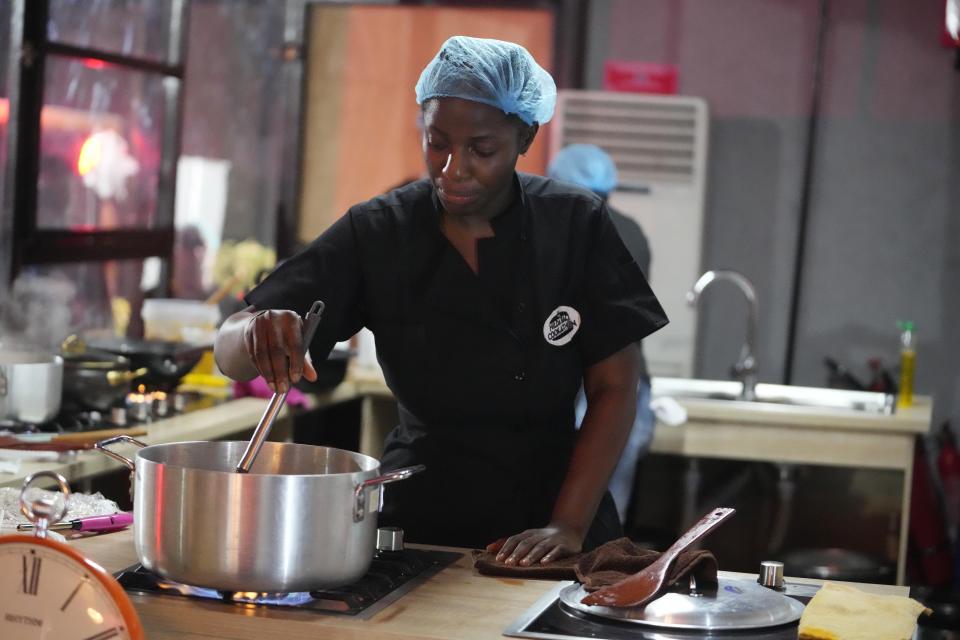 Chef, Hilda Baci, cooked to establish a new Guinness world record , for the "longest cooking marathon". The 97-hour cook-a-thon in Lagos, Nigeria. Saturday, May. 13, 2023. A Nigerian chef on Monday continued her quest to set a new global record for the longest hours of nonstop cooking after surpassing the current record of 87 hours and 45 minutes. By 15:00 GMT on Monday, Hilda Baci had cooked for more than 97 hours, becoming a national sensation and to the cheering of many in Nigeria's commercial hub of Lagos where her kitchen is set. (AP Photo/Sunday Alamba)