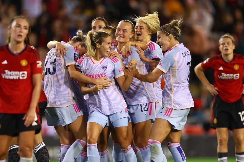 Celebration: Arsenal Women snatched a late draw against Manchester United in the WSL (REUTERS)