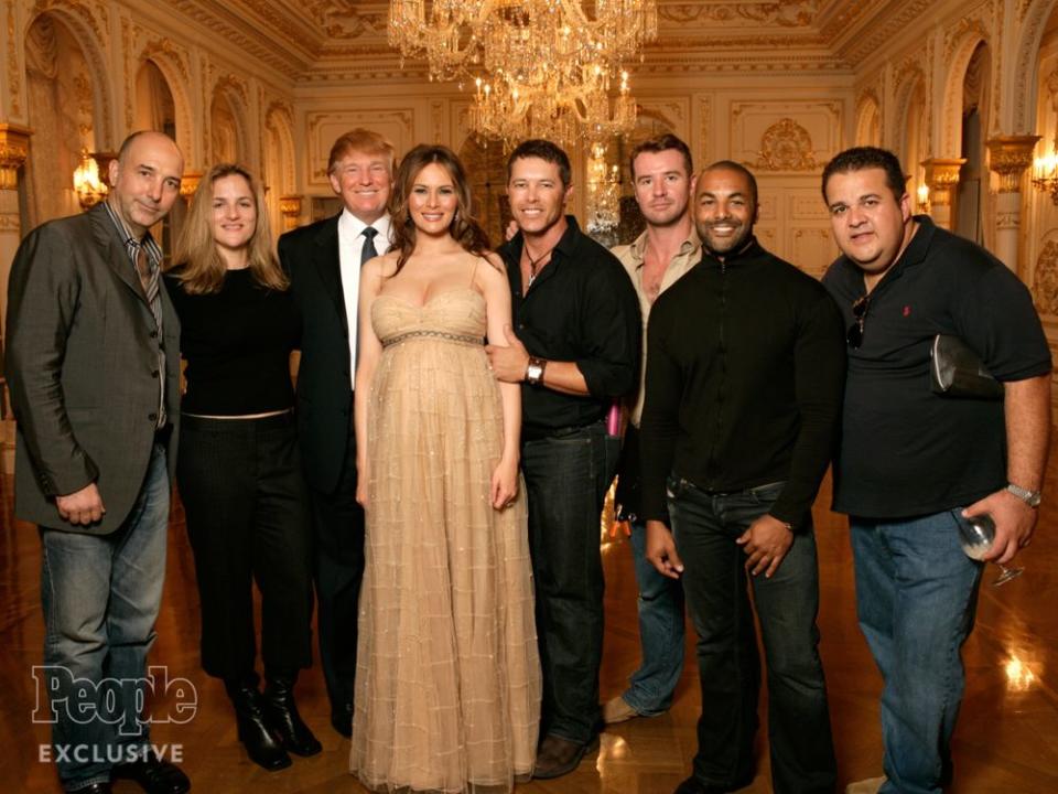 Natasha Stoynoff (second from left) with Donald and Melania Trump and others in 2005