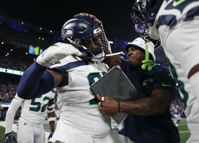 Rookie Devon Witherspoon scores on 97-yard pick six as Seahawks D