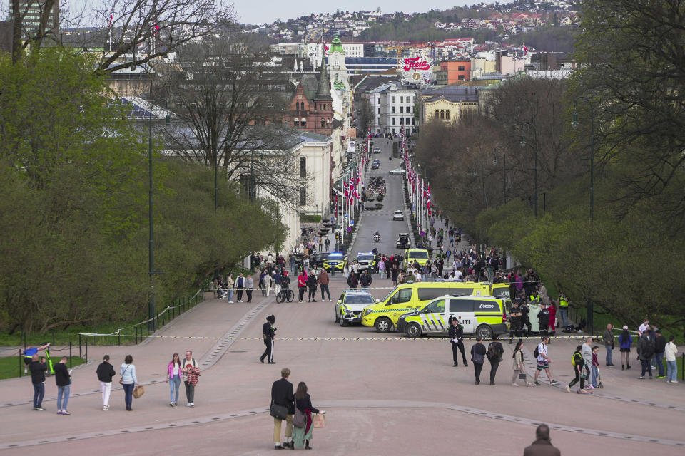 Emergency services at the scene after a person was attacked in Oslo, Wednesday, May 1, 2024. A man carrying two knives stabbed one person and threatened around ten others in the center of Oslo, Wednesday. (Heiko Junge/NTB Scanpix via AP)