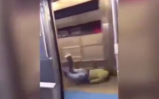 The man faceplants ontot the train platform. Source:Queshabaybae.