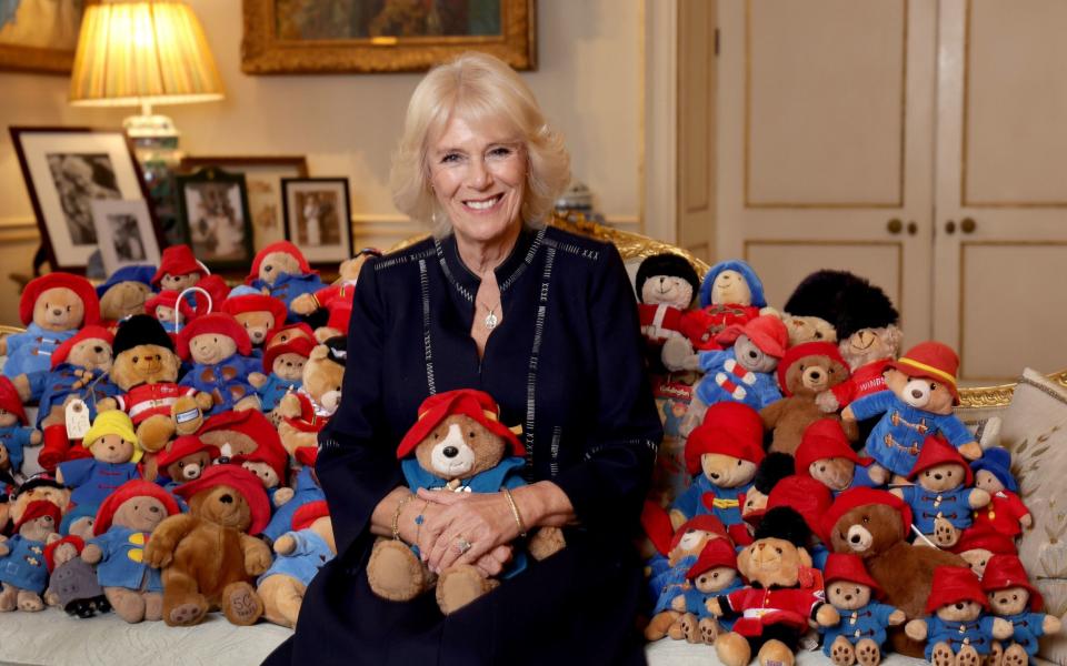 The Queen Consort with a collection of Paddington Bears that will be handed out to children at a teddy bear’s picnic at Barnardo’s Nursery in Bow, east London, next week - Chris Jackson/Buckingham Palace via Getty Images