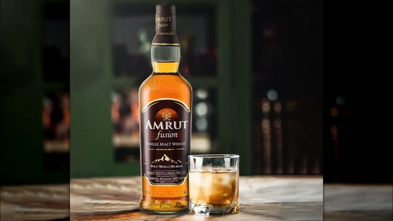 amrut fusion whisky and glass